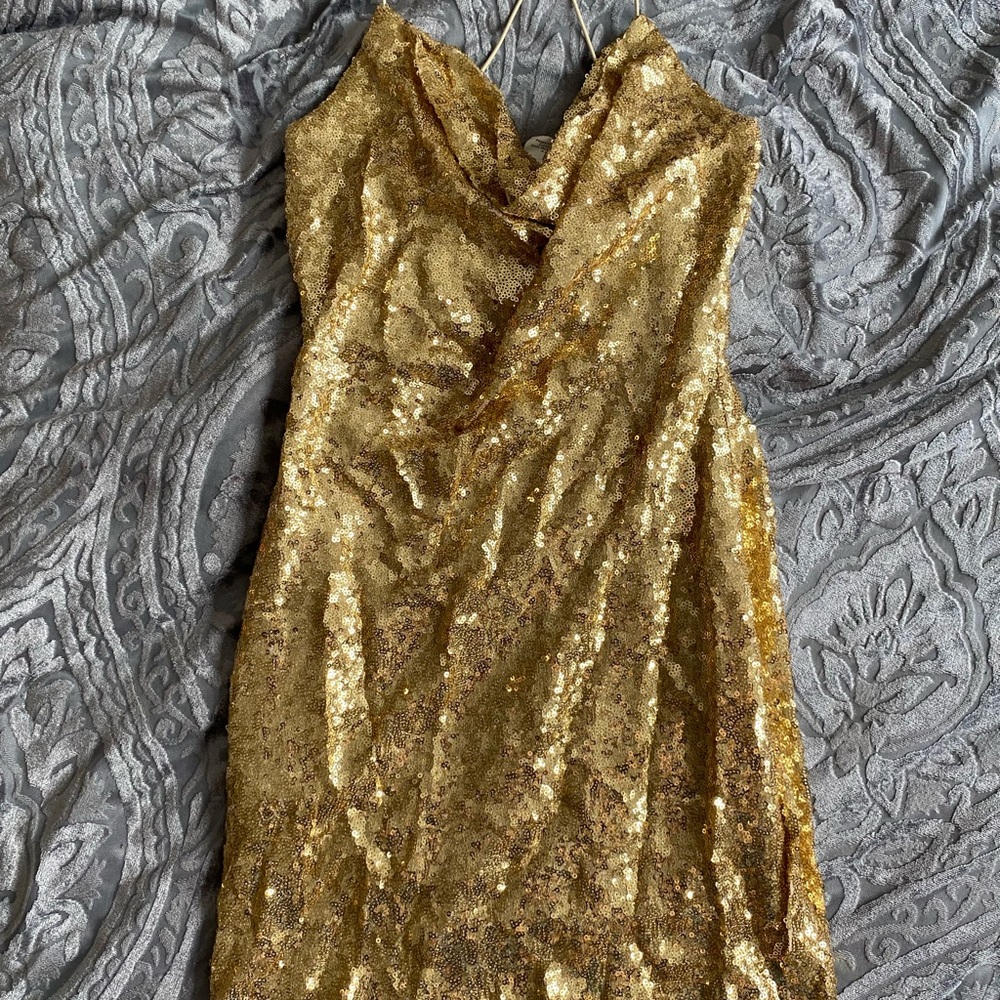 Women’s gold mini body con dress